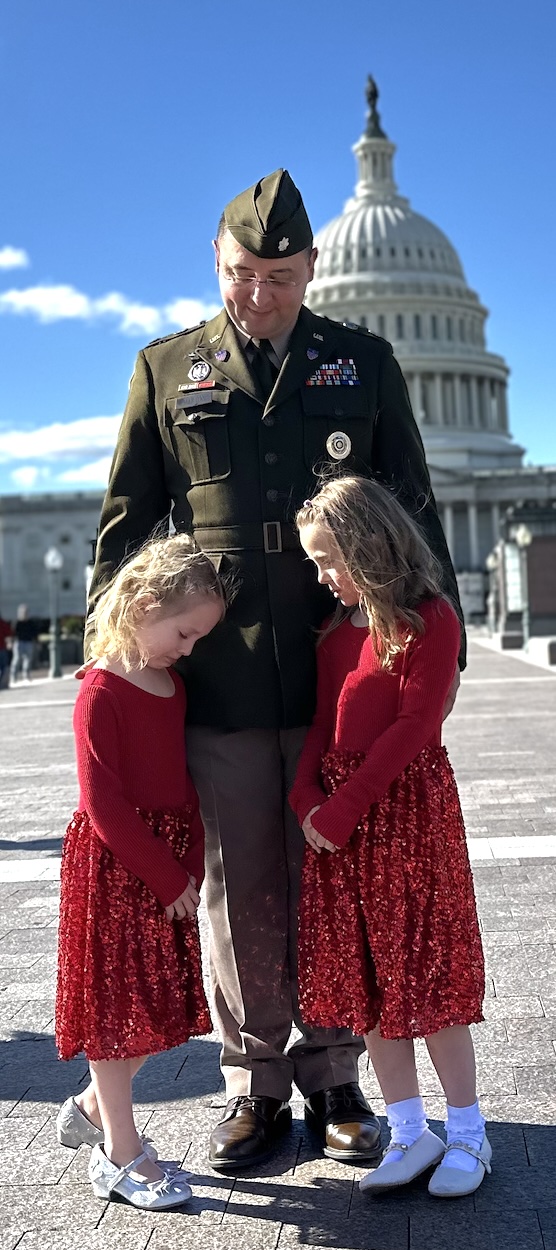 Casey and the girls in front of the U.S. Capitol
